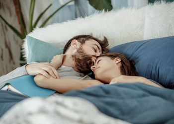 Cuddlers, Rejoice! Science Proves Sleeping With Someone Else Is Good For Health